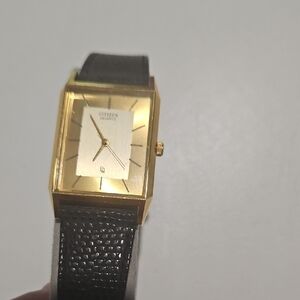Citizen Quartz Gold and Black Watch with Elegant Rectangular Design - NEW
